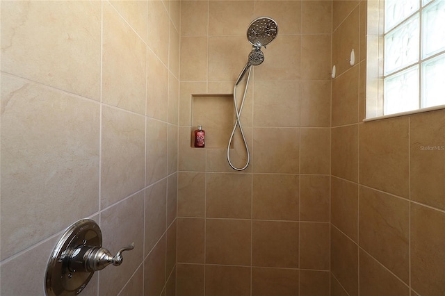 details featuring a tile shower