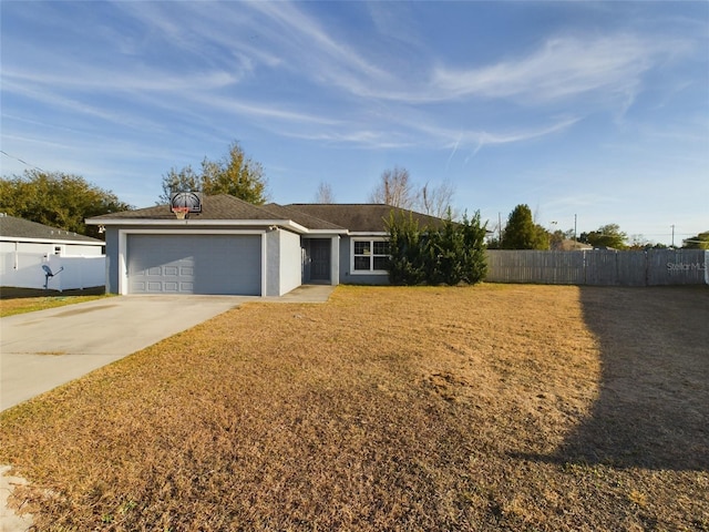 ranch-style home featuring a garage and a front yard