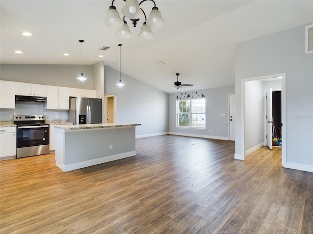 kitchen with white cabinetry, a center island, pendant lighting, stainless steel appliances, and light hardwood / wood-style floors