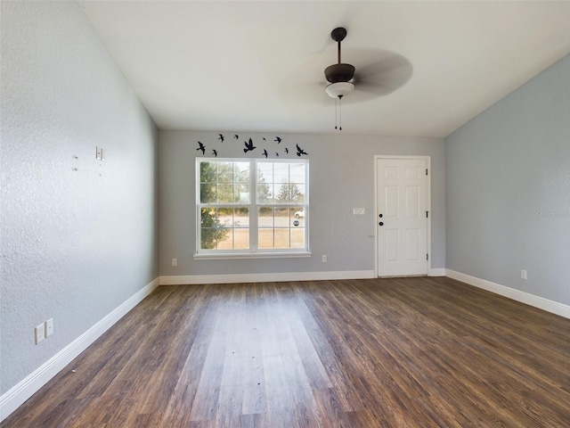 unfurnished dining area with dark hardwood / wood-style floors and ceiling fan