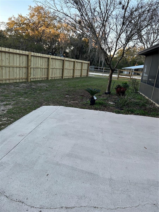 view of yard featuring fence