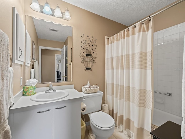 full bathroom with shower / tub combo, vanity, toilet, and a textured ceiling