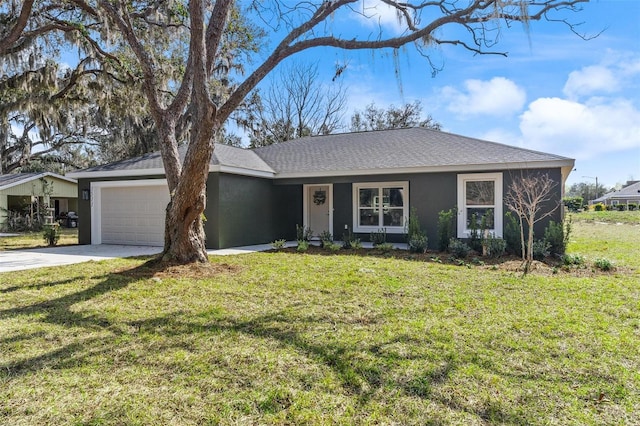 ranch-style house with a garage and a front yard