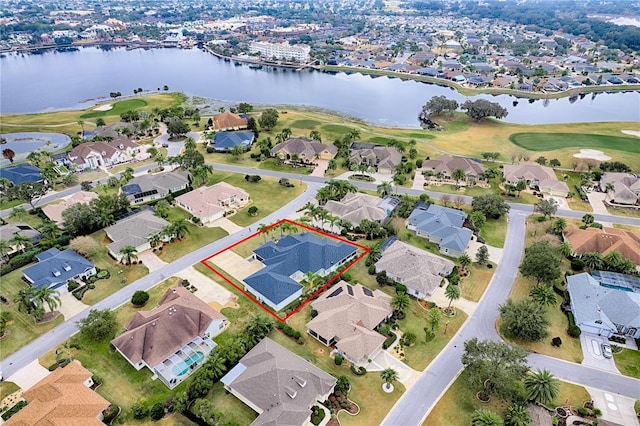 bird's eye view with a water view