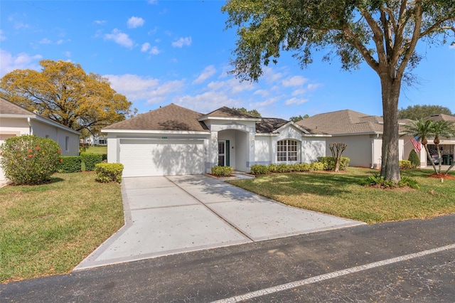 ranch-style home with a garage and a front lawn