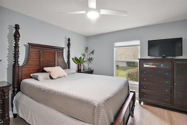 bedroom featuring light hardwood / wood-style floors and ceiling fan