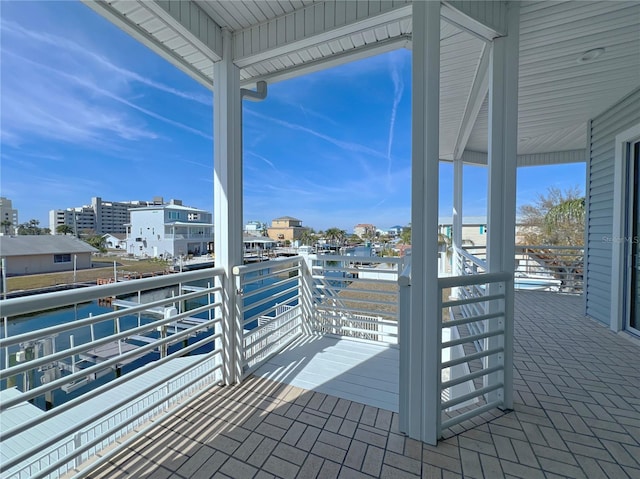 view of patio featuring a balcony