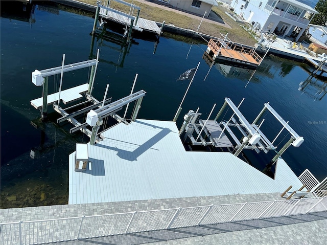 dock area with a water view