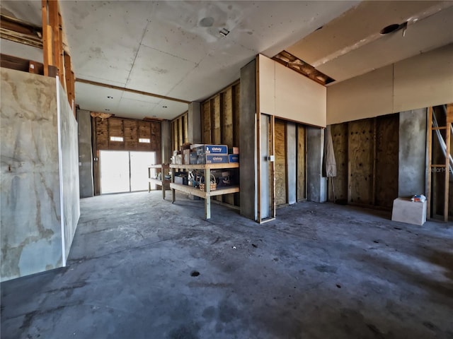 misc room with concrete floors