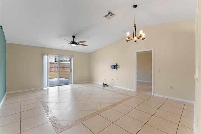 tiled spare room with lofted ceiling and ceiling fan with notable chandelier