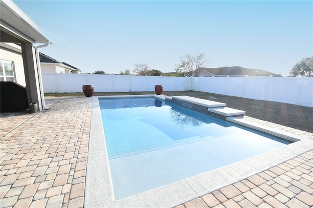 view of pool with a patio