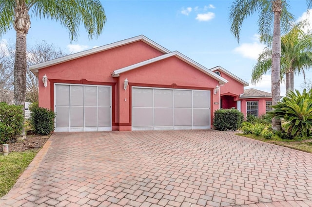 single story home with a garage