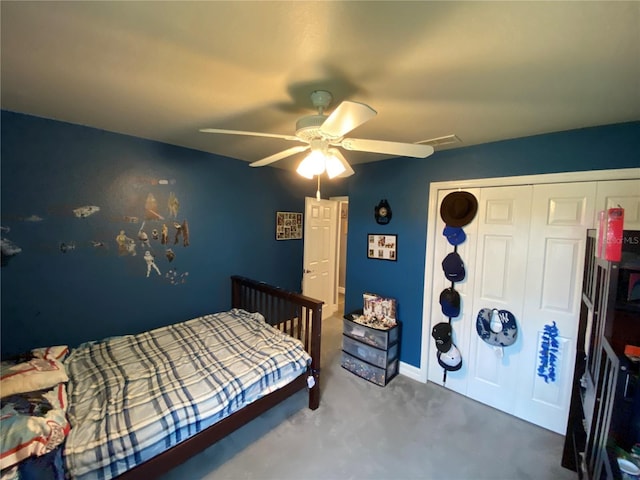 bedroom with ceiling fan and a closet