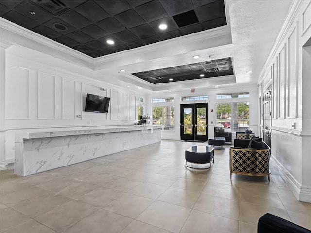 building lobby featuring visible vents