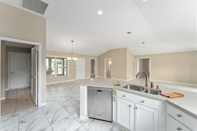 kitchen with vaulted ceiling, pendant lighting, dishwasher, sink, and white cabinets