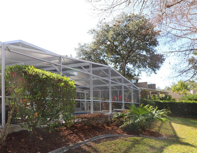 view of yard with a lanai