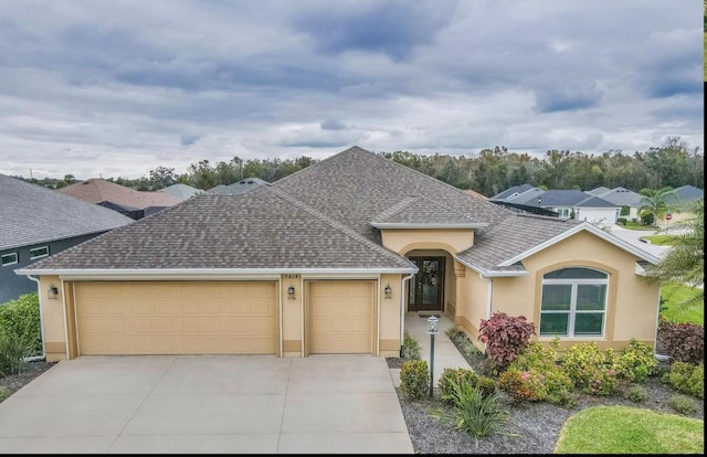 single story home featuring a garage