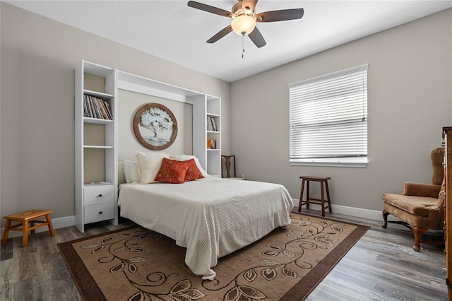 bedroom featuring ceiling fan and wood-type flooring