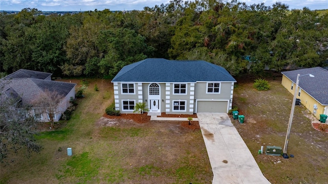 view of front of house with a garage