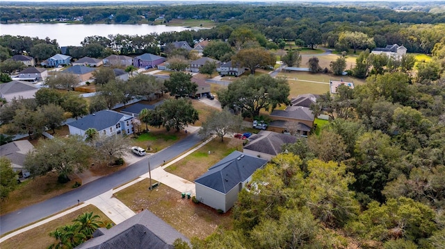 drone / aerial view with a water view