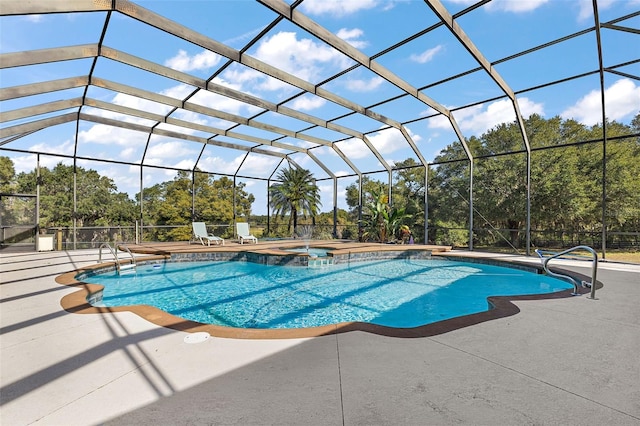 view of pool featuring an in ground hot tub, a lanai, and a patio