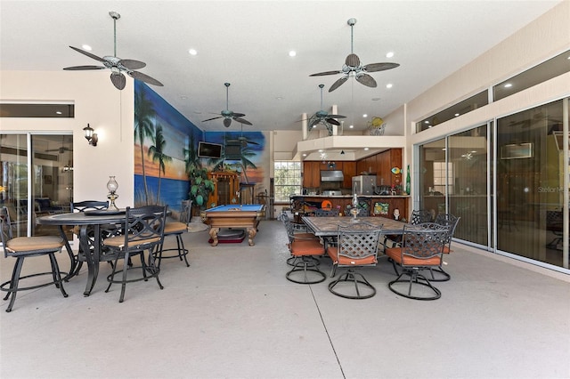 view of patio / terrace featuring ceiling fan