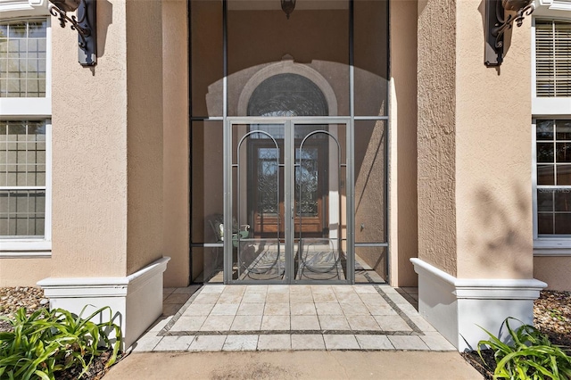 entrance to property featuring french doors