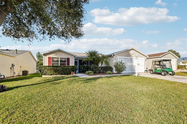 ranch-style home featuring a garage, cooling unit, and a front lawn