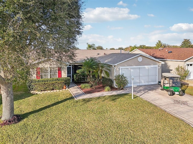 ranch-style home with a garage and a front yard