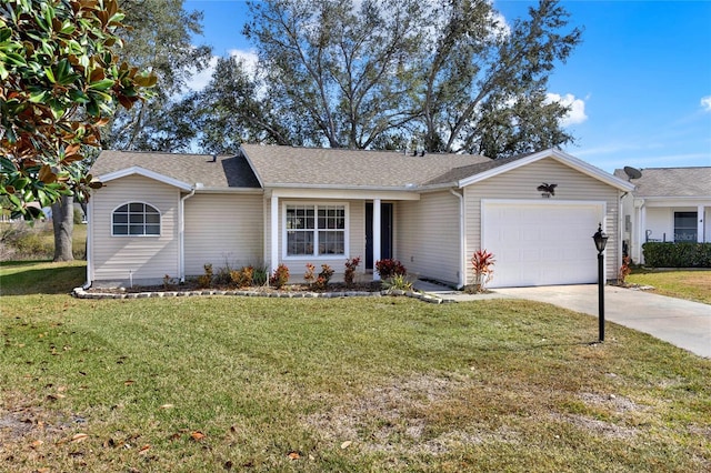 ranch-style home with a garage and a front lawn