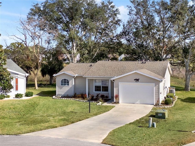 ranch-style home with a garage and a front lawn