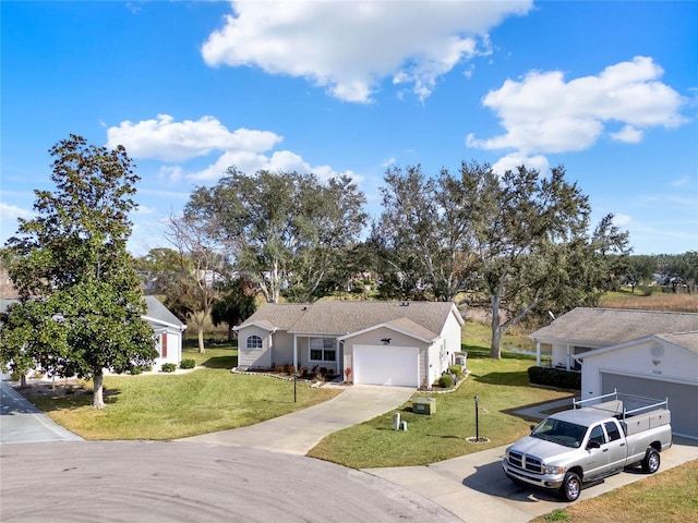 single story home featuring a garage and a front lawn