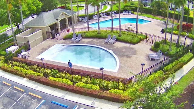 view of pool featuring a patio area