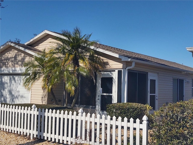 view of home's exterior with a garage