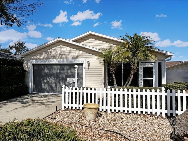 view of front of property with a garage