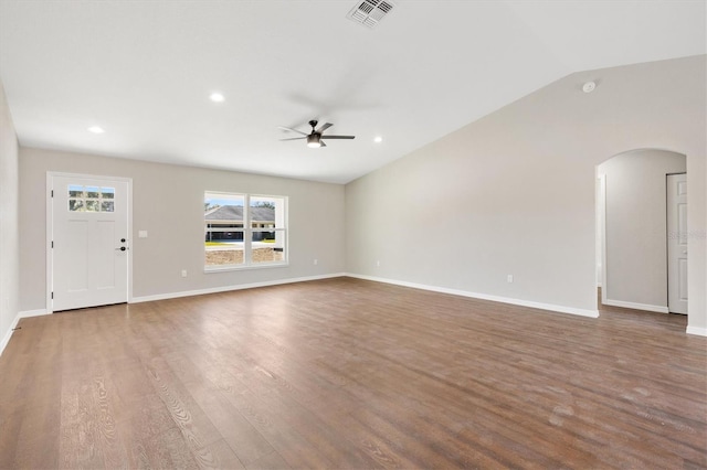 202 Shannon Ln, Lady Lake, FL 32159 - unfurnished living room featuring lofted ceiling, wood-type flooring, and ceiling fan