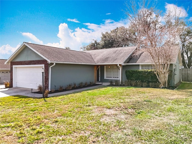 ranch-style home featuring a garage and a front yard