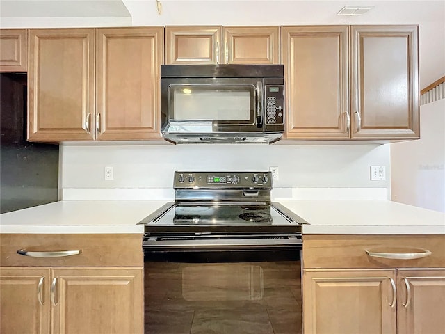 kitchen featuring black appliances