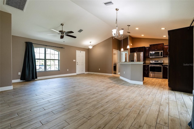 kitchen with stainless steel appliances, visible vents, and open floor plan