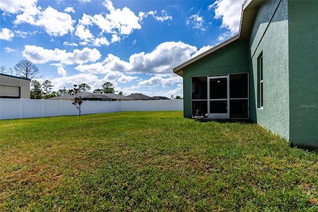 view of yard with fence