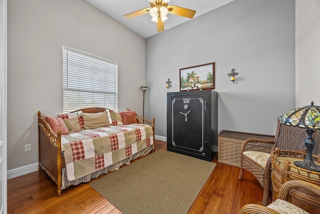 bedroom featuring hardwood / wood-style flooring and ceiling fan