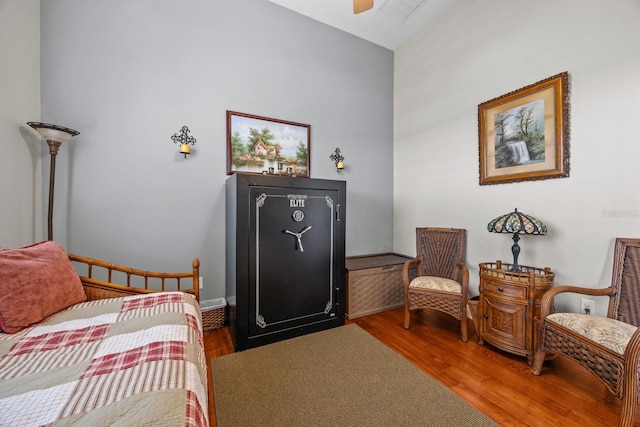 bedroom featuring vaulted ceiling, ceiling fan, and hardwood / wood-style floors