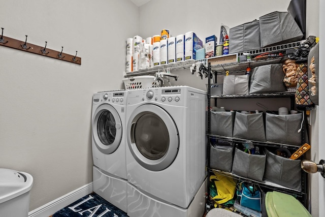 laundry area with washer and clothes dryer