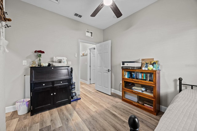 bedroom featuring light hardwood / wood-style flooring and ceiling fan