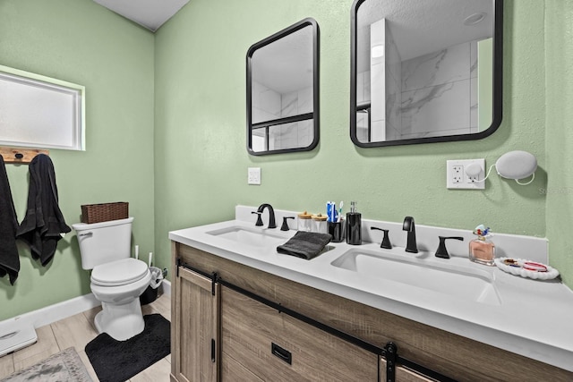 bathroom with walk in shower, vanity, toilet, and hardwood / wood-style flooring