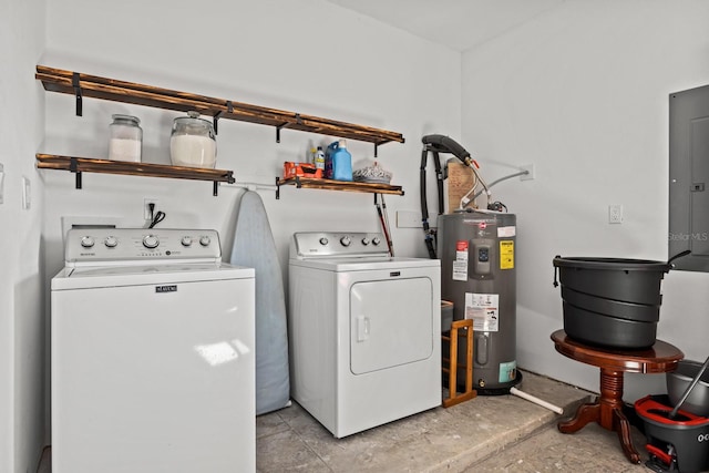 washroom with water heater and washer and clothes dryer