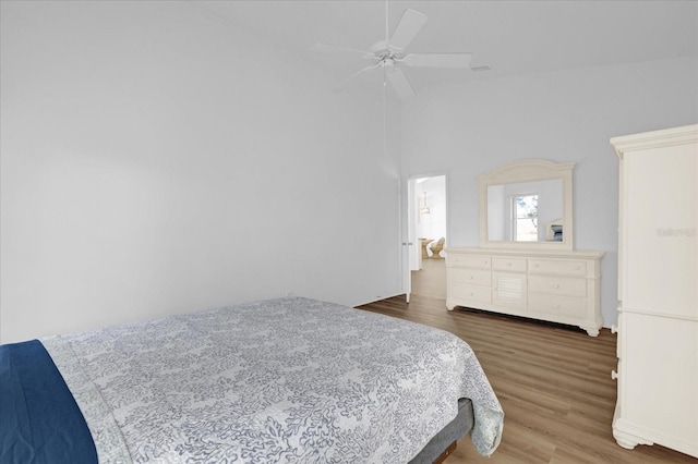 bedroom featuring dark hardwood / wood-style floors and ceiling fan