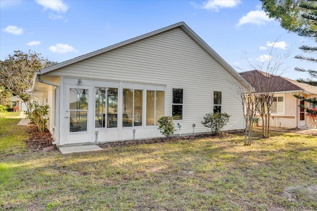 view of home's exterior featuring a yard