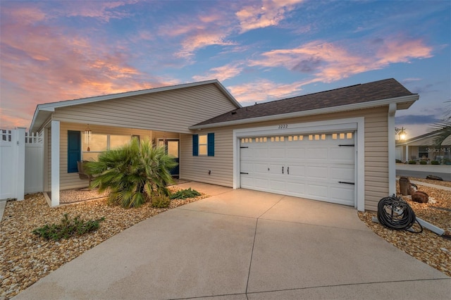 view of front of property with a garage