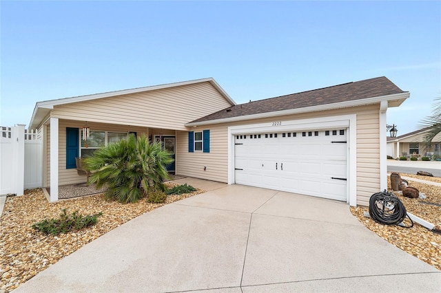 ranch-style home with a garage